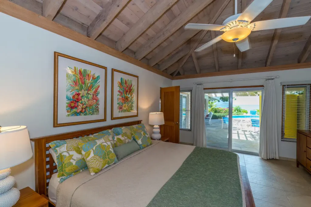 bedroom with large bed at beachcomber villa