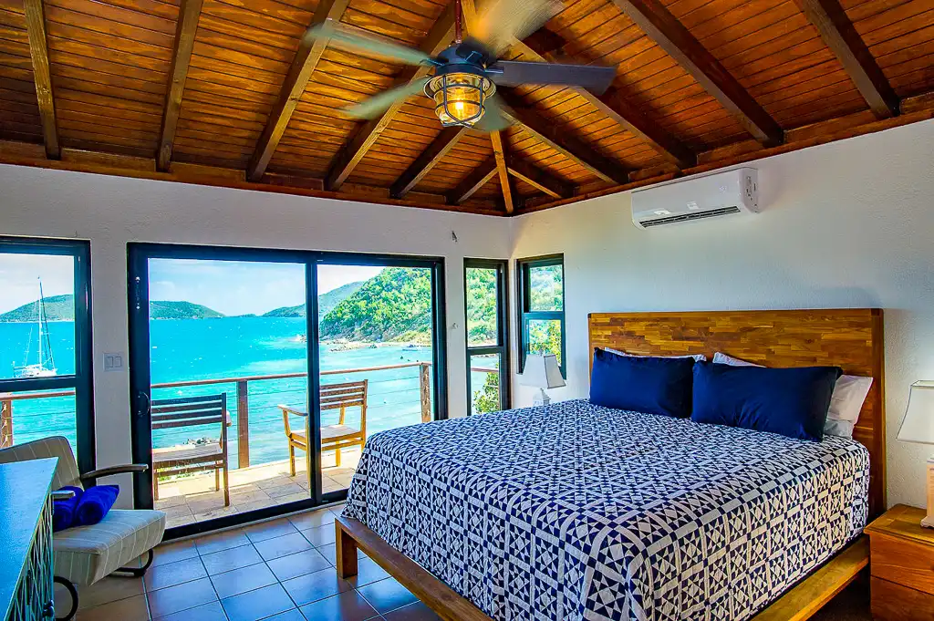 Rainbow's End Villa's bedroom with balcony